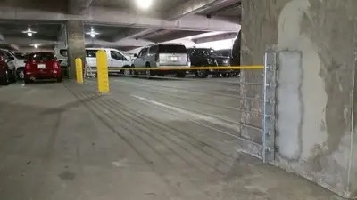 Barrier cable work in a South Florida parking structure