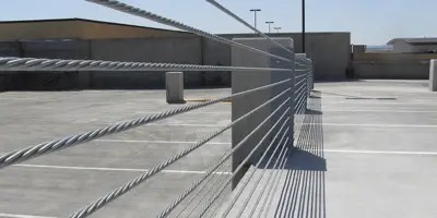 Barrier cable work in a South Florida parking structure