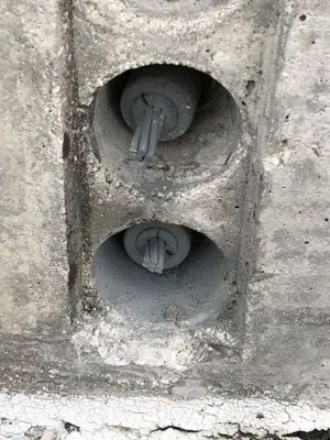 Barrier cable work in a South Florida parking structure