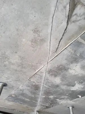 Epoxy crack injection on structural concrete