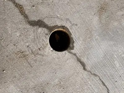 Epoxy crack injection on structural concrete