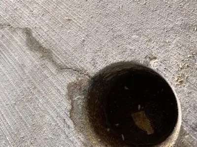 Epoxy crack injection on structural concrete