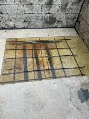 Post-tension tendon repair on a concrete slab